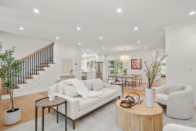 1 Cole Rd, Wayland, MA 01778 - living area with light wood-type flooring, ornamental molding, recessed lighting, stairway, and baseboards