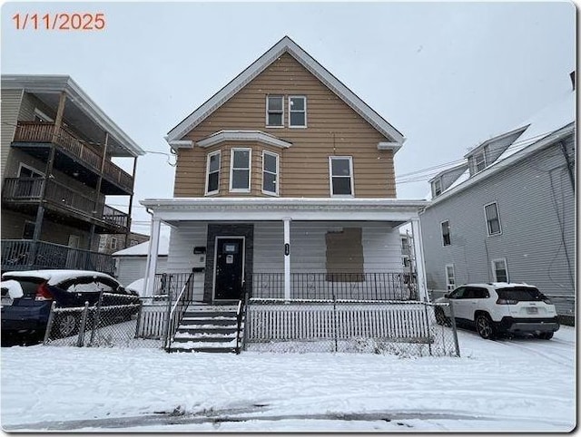 view of front property with covered porch