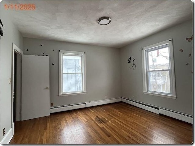 unfurnished room featuring wood-type flooring