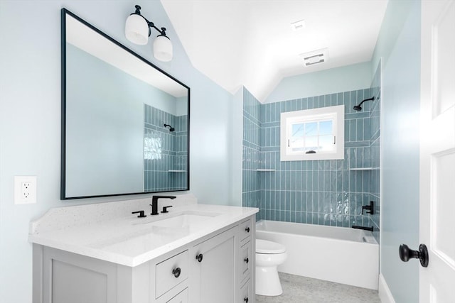 bathroom with toilet, visible vents, tub / shower combination, and vanity