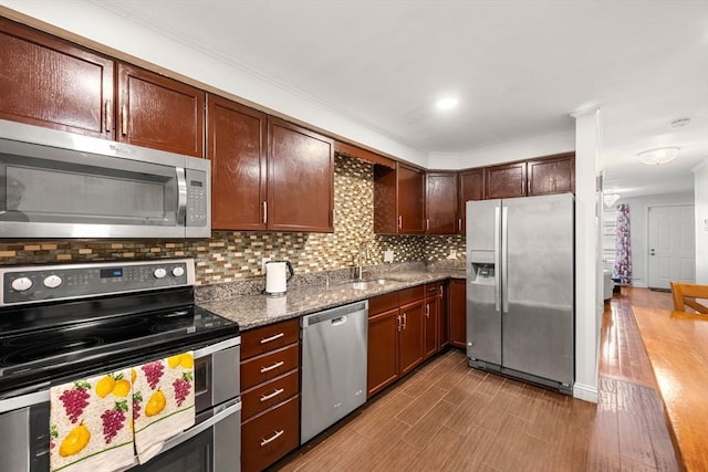 251 Norfolk St Unit A, Boston, MA 02124 - kitchen featuring stainless steel appliances, dark wood-type flooring, backsplash, and stone counters