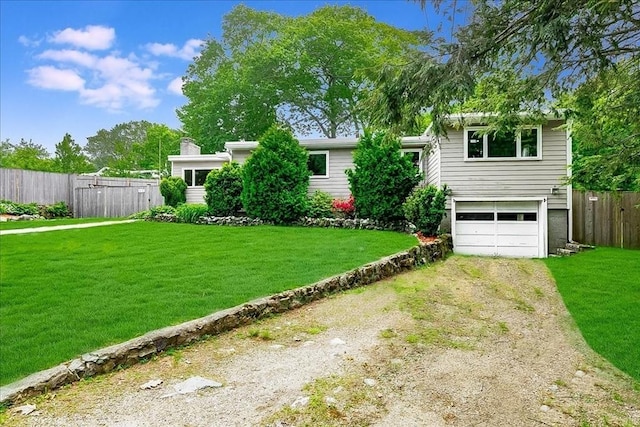 68 Walnut Rd, Swampscott, MA 01907 - view of yard featuring dirt driveway and an attached garage