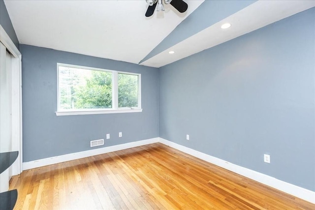 68 Walnut Rd, Swampscott, MA 01907 - unfurnished bedroom featuring a closet, light wood finished floors, baseboards, vaulted ceiling, and recessed lighting