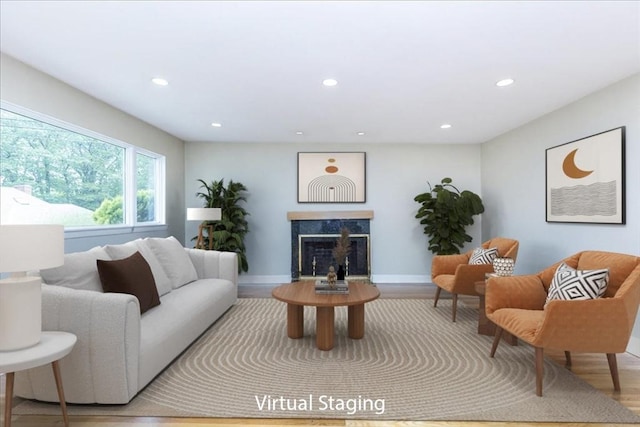 68 Walnut Rd, Swampscott, MA 01907 - living area with recessed lighting, wood finished floors, a premium fireplace, and baseboards