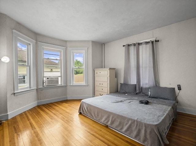 4 Darling St, Worcester, MA 01605 - bedroom featuring baseboards, hardwood / wood-style flooring, and cooling unit