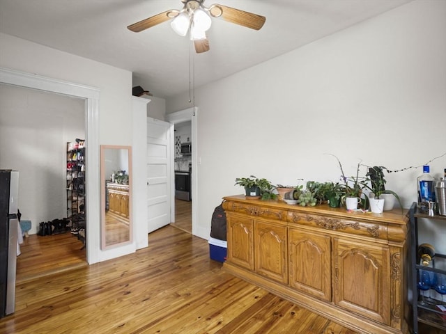4 Darling St, Worcester, MA 01605 - interior space with stainless steel microwave, stove, ceiling fan, and light wood-style flooring