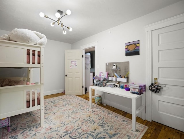 4 Darling St, Worcester, MA 01605 - bedroom featuring wood finished floors and a chandelier