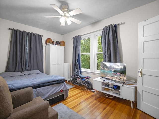 4 Darling St, Worcester, MA 01605 - bedroom featuring wood finished floors, radiator, and ceiling fan
