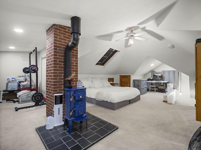 4 Darling St, Worcester, MA 01605 - carpeted bedroom featuring lofted ceiling, a ceiling fan, a wood stove, and recessed lighting