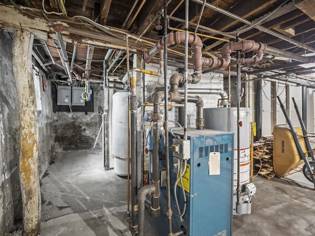 4 Darling St, Worcester, MA 01605 - utilities featuring water heater, gas water heater, electric panel, and a heating unit