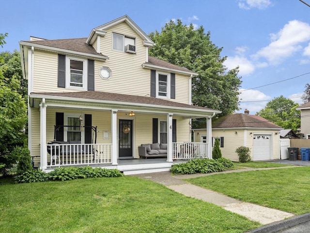 4 Darling St, Worcester, MA 01605 - view of front of home featuring a porch, a front yard, and a detached garage