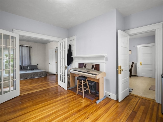 4 Darling St, Worcester, MA 01605 - home office featuring french doors and hardwood / wood-style flooring