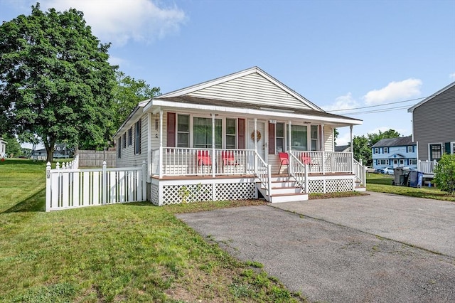 33 Hopkins St, Dracut, MA 01826 - bungalow featuring covered porch