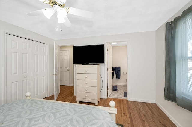 33 Hopkins St, Dracut, MA 01826 - bedroom with wood finished floors, a closet, ceiling fan, and connected bathroom