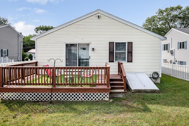 33 Hopkins St, Dracut, MA 01826 - rear view of property with a wooden deck, a yard, and cooling unit