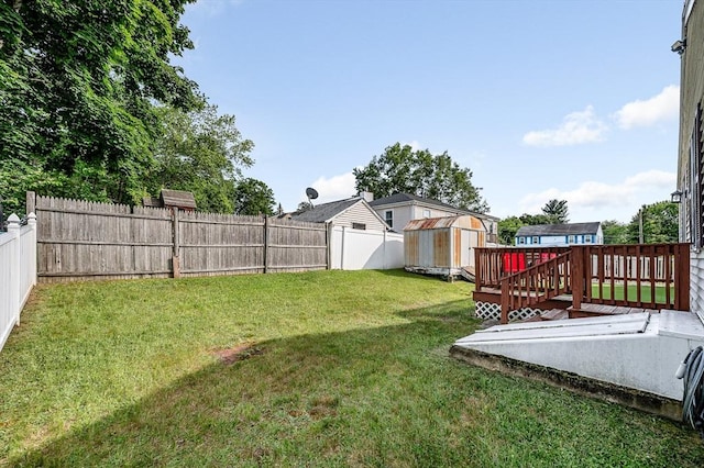 33 Hopkins St, Dracut, MA 01826 - fenced backyard featuring a storage shed