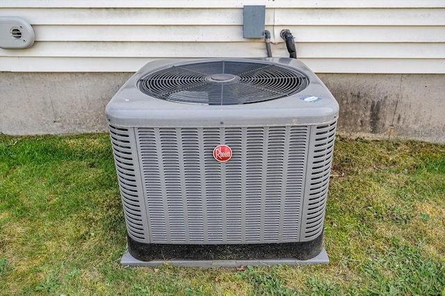 33 Hopkins St, Dracut, MA 01826 - exterior view of a central AC unit