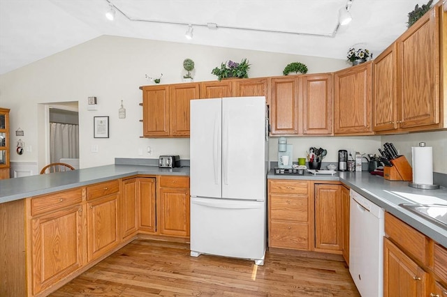 33 Hopkins St, Dracut, MA 01826 - kitchen with white appliances, rail lighting, lofted ceiling, light wood finished floors, and a peninsula