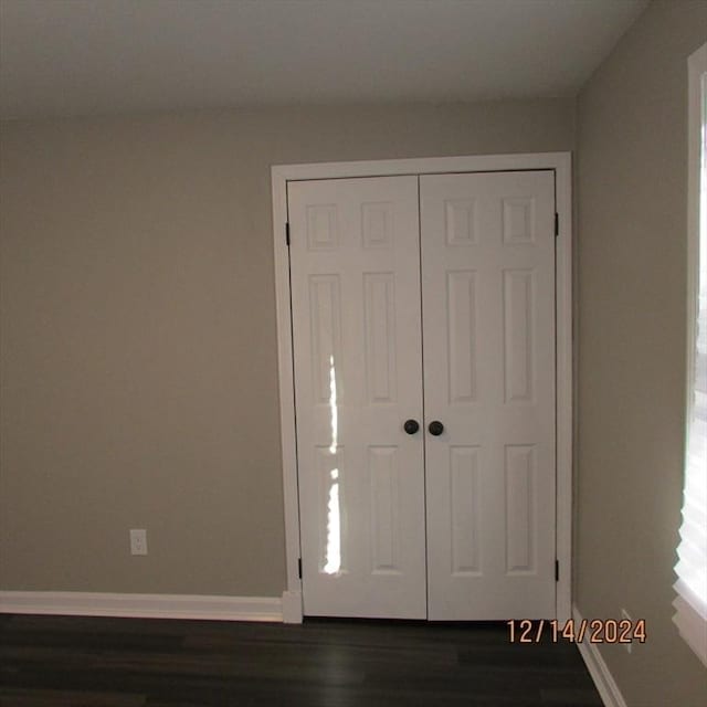 entrance foyer featuring dark hardwood / wood-style floors