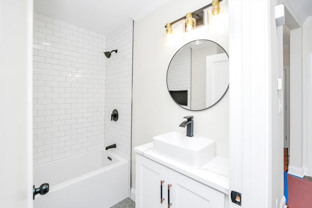 bathroom featuring vanity and tiled shower / bath combo