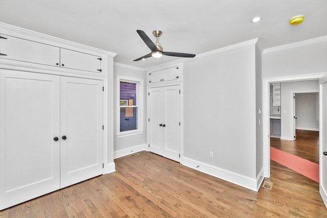 unfurnished bedroom with ceiling fan, light hardwood / wood-style floors, and ornamental molding