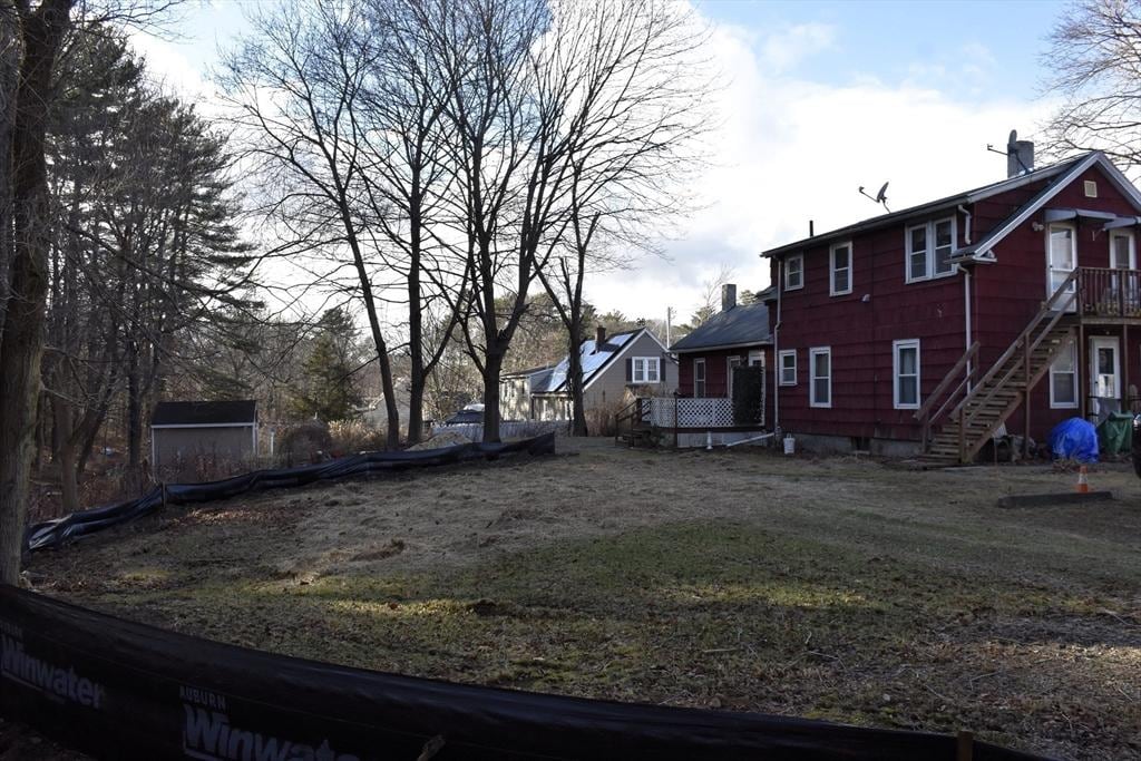 view of yard featuring a wooden deck