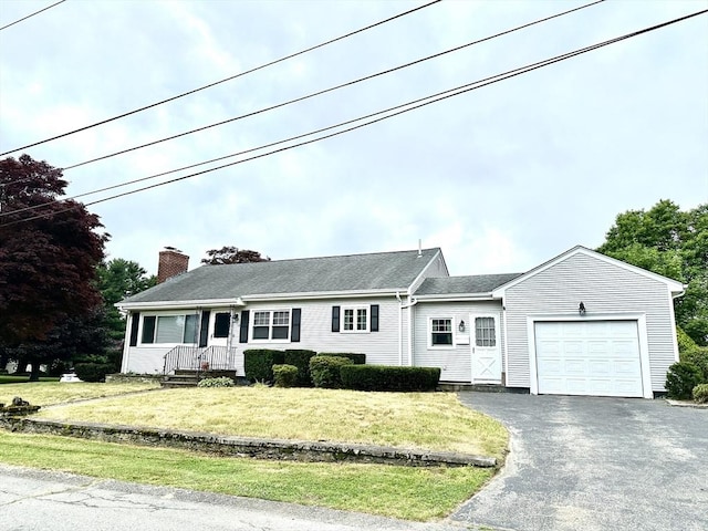 15 Evans, Somerset, MA 02726 - ranch-style house featuring an attached garage, a chimney, asphalt driveway, and a front lawn