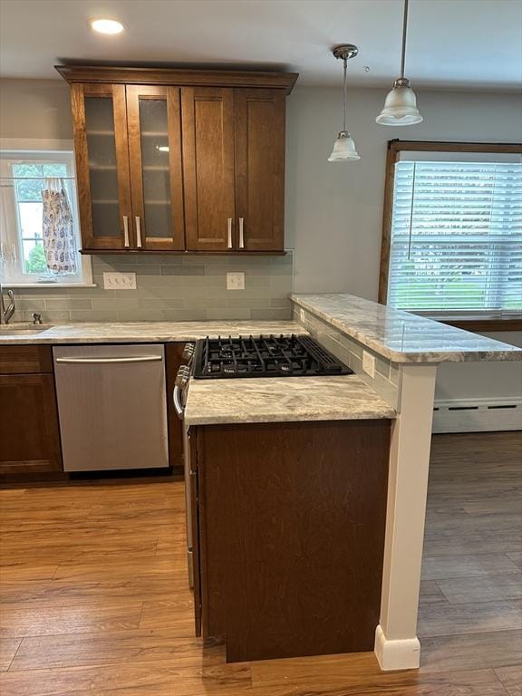 15 Evans, Somerset, MA 02726 - kitchen featuring stainless steel dishwasher, a baseboard radiator, backsplash, light wood finished floors, and recessed lighting