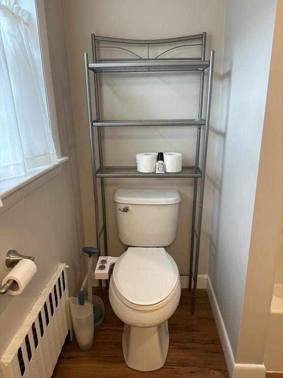 15 Evans, Somerset, MA 02726 - bathroom featuring radiator heating unit and wood finished floors