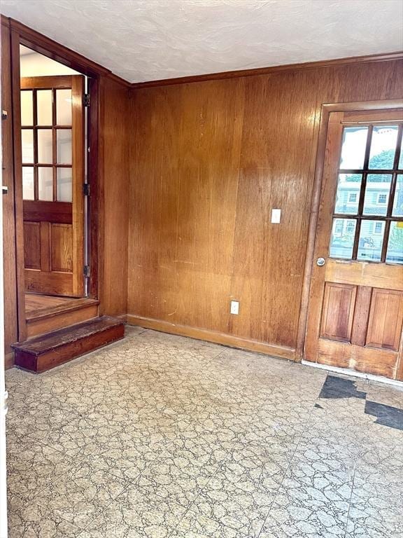 15 Evans, Somerset, MA 02726 - entrance foyer with wood walls and baseboards