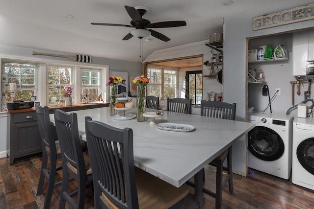 dining space with dark wood-style flooring, independent washer and dryer, and a ceiling fan