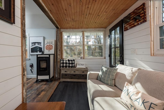 sunroom / solarium featuring wooden ceiling