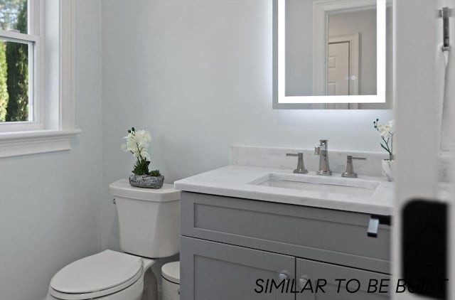 10 Webber Ave Unit 1A, Bedford, MA 01730 - bathroom featuring vanity and toilet