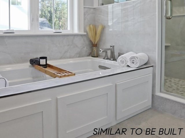 10 Webber Ave Unit 1A, Bedford, MA 01730 - full bath featuring a shower stall, a garden tub, healthy amount of natural light, and vanity