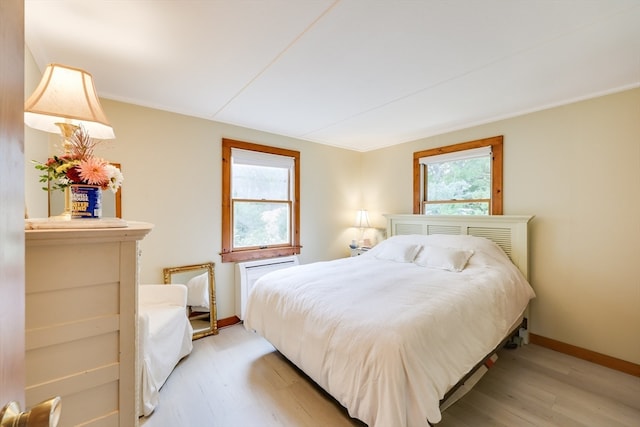 bedroom featuring hardwood / wood-style floors