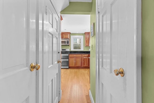 hall featuring light wood-type flooring