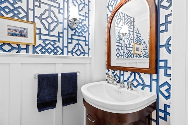 bathroom with a decorative wall