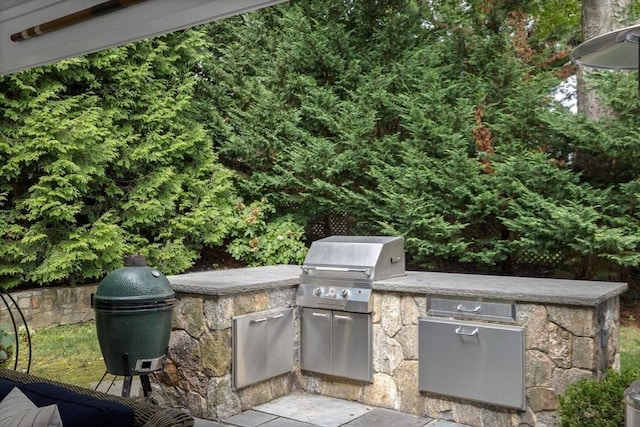 view of patio featuring a grill and area for grilling