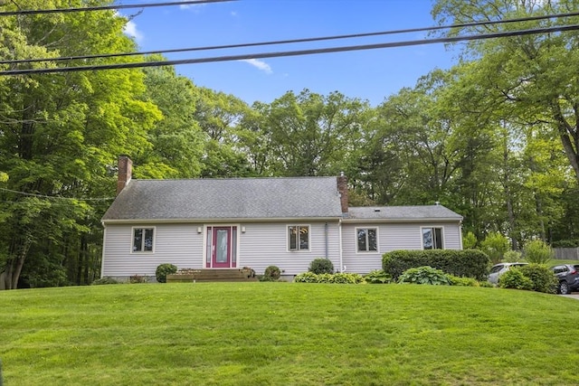 424 Sudbury St, Marlborough, MA 01752 - view of front of home featuring a chimney and a front lawn