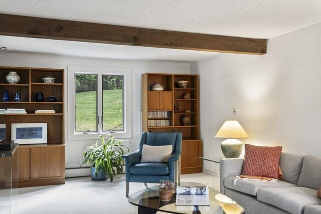 424 Sudbury St, Marlborough, MA 01752 - living room featuring beamed ceiling and a baseboard heating unit