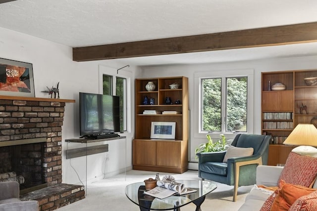 424 Sudbury St, Marlborough, MA 01752 - carpeted living room with beamed ceiling, a brick fireplace, a baseboard heating unit, and a textured ceiling