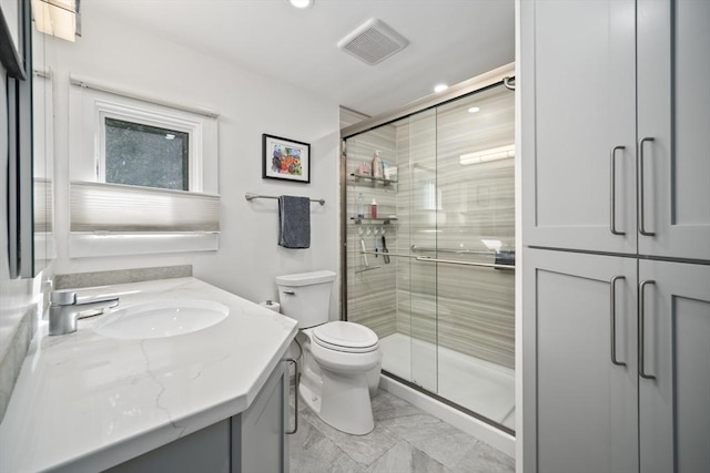 424 Sudbury St, Marlborough, MA 01752 - full bath with vanity, a shower stall, toilet, and recessed lighting