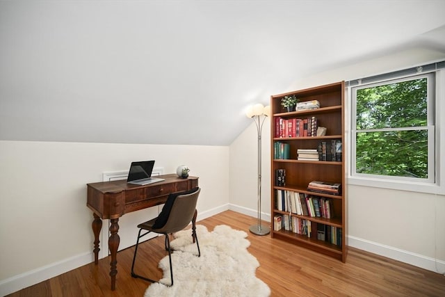 424 Sudbury St, Marlborough, MA 01752 - office area featuring baseboards, wood finished floors, and vaulted ceiling