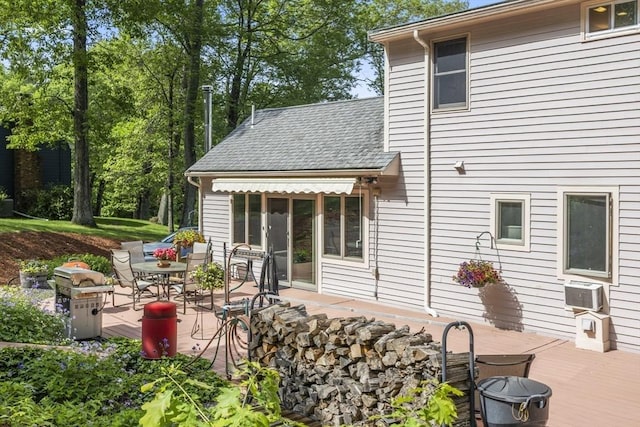 424 Sudbury St, Marlborough, MA 01752 - back of property with a wooden deck and a shingled roof
