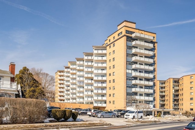 view of property with uncovered parking