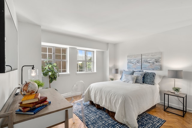 bedroom with parquet flooring