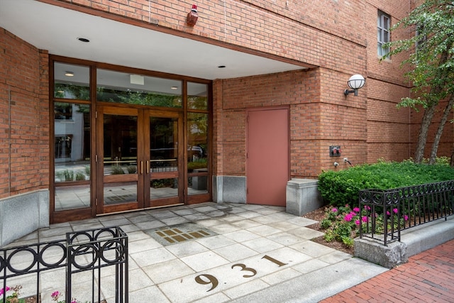 property entrance with french doors and a patio area