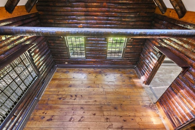 135 Pine St, Rochester, MA 02770 - interior space featuring hardwood / wood-style flooring, log walls, and beamed ceiling