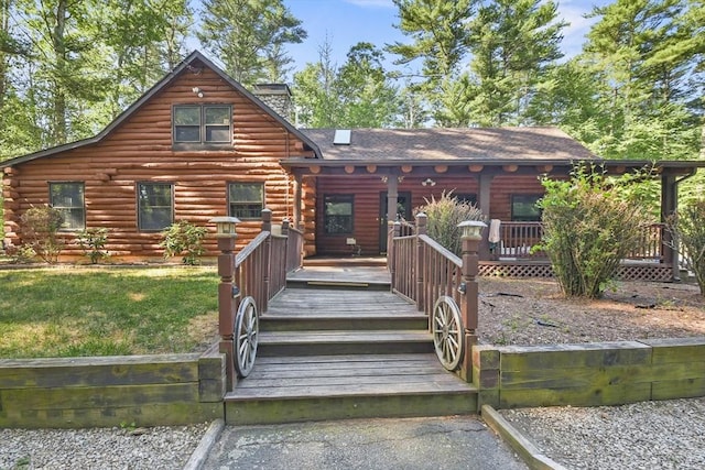 135 Pine St, Rochester, MA 02770 - log-style house featuring log siding and covered porch