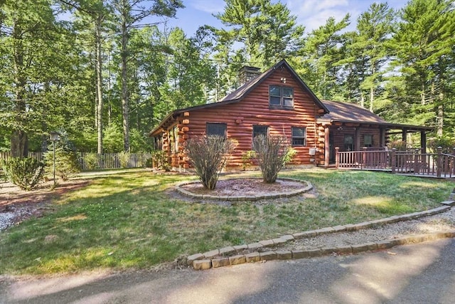 135 Pine St, Rochester, MA 02770 - view of front of home featuring log siding, a chimney, and a porch